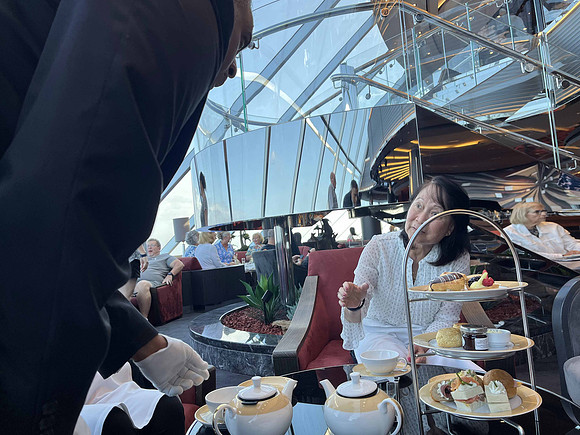Butler serving us tea